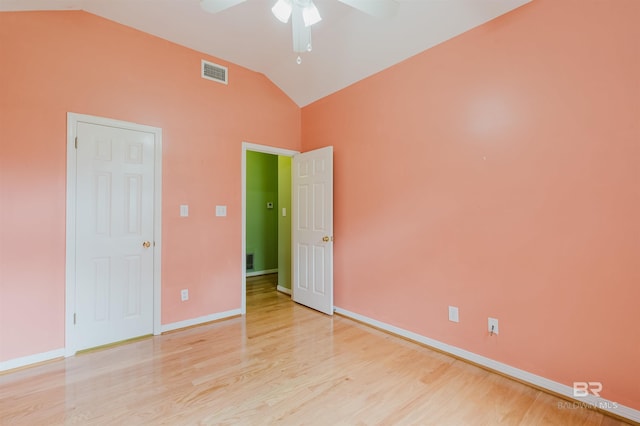 19711 Hunters Loop, Fairhope, AL 36532 - empty room featuring ceiling fan, light wood-type flooring, baseboards, and high vaulted ceiling