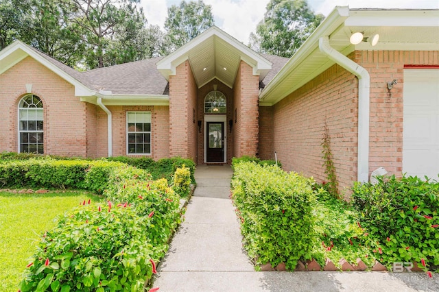 19711 Hunters Loop, Fairhope, AL 36532 - entrance to property with brick siding, an attached garage, and roof with shingles