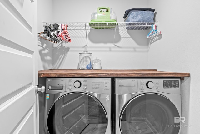 washroom featuring separate washer and dryer