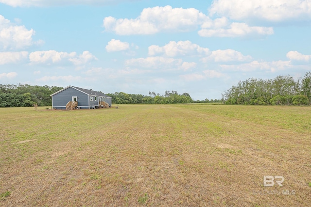 view of yard featuring a rural view