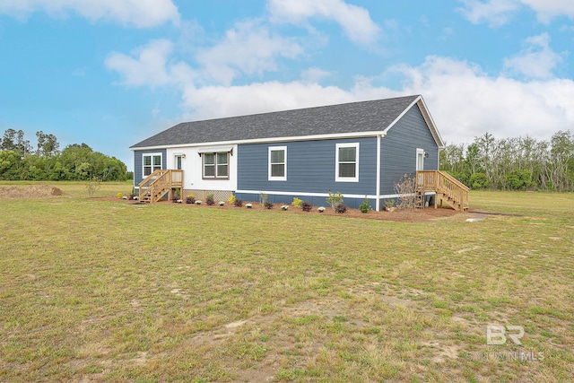 view of front facade with a front yard