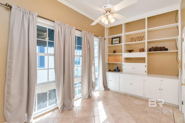 interior space featuring ceiling fan and light tile patterned floors