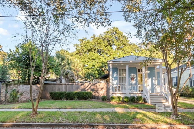 bungalow with a front lawn