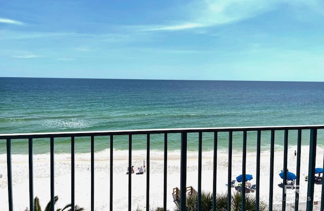 view of water feature with a beach view