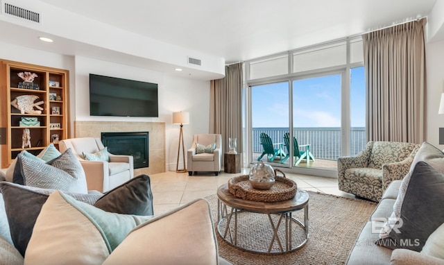26302 Perdido Beach Blvd Unit D708, Orange Beach, AL 36561 - tiled living area with a fireplace and recessed lighting