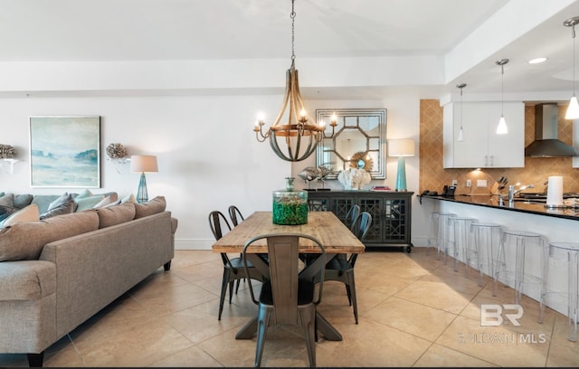 26302 Perdido Beach Blvd Unit D708, Orange Beach, AL 36561 - dining room with a chandelier and light tile patterned flooring