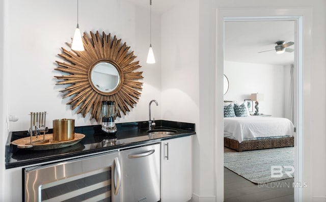 26302 Perdido Beach Blvd Unit D708, Orange Beach, AL 36561 - indoor wet bar with beverage cooler, pendant lighting, and wood finished floors