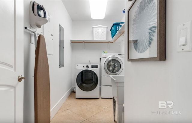 26302 Perdido Beach Blvd Unit D708, Orange Beach, AL 36561 - laundry room with washer and dryer and light tile patterned floors