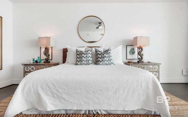 26302 Perdido Beach Blvd Unit D708, Orange Beach, AL 36561 - bedroom with baseboards and dark wood-style flooring