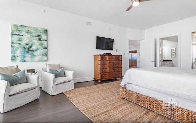 26302 Perdido Beach Blvd Unit D708, Orange Beach, AL 36561 - bedroom with dark wood finished floors, a ceiling fan, and ensuite bath