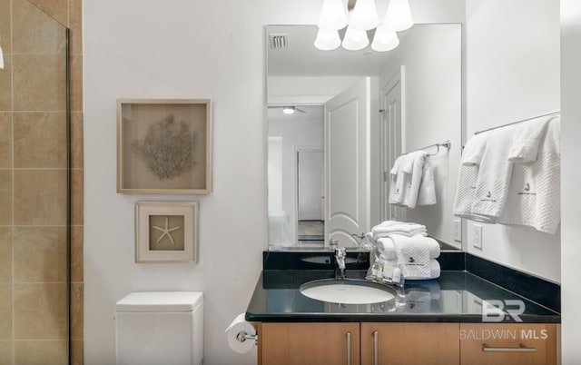 26302 Perdido Beach Blvd Unit D708, Orange Beach, AL 36561 - bathroom with vanity, a chandelier, and a tile shower