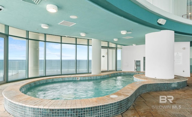 26302 Perdido Beach Blvd Unit D708, Orange Beach, AL 36561 - indoor pool featuring a water view
