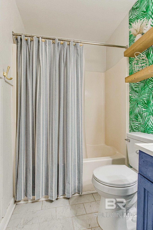 full bathroom featuring vanity, toilet, and shower / bath combo with shower curtain