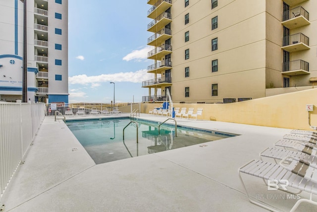 view of pool featuring a patio area