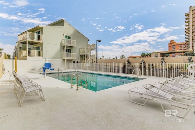 view of pool with a patio