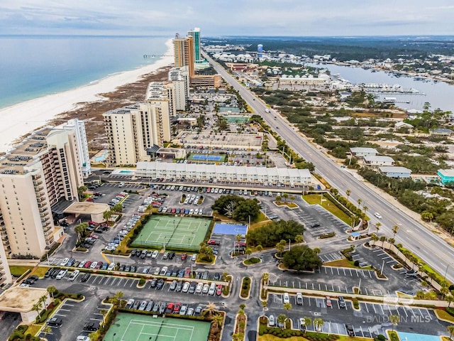 aerial view with a beach view and a water view