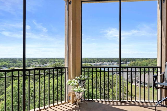 unfurnished sunroom featuring a wealth of natural light