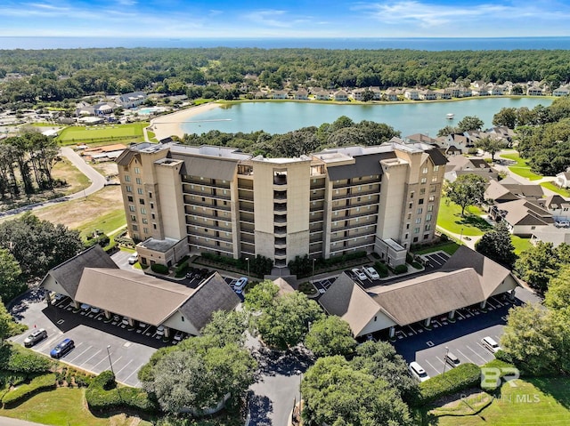 birds eye view of property featuring a water view
