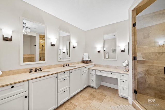 full bathroom featuring vanity and a shower stall