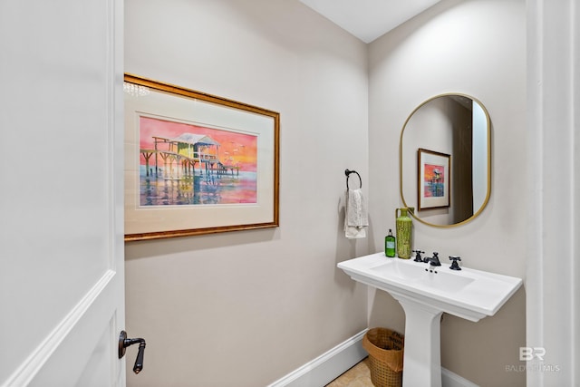 bathroom featuring baseboards