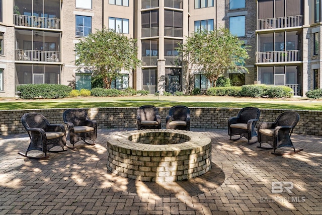view of patio / terrace with a fire pit
