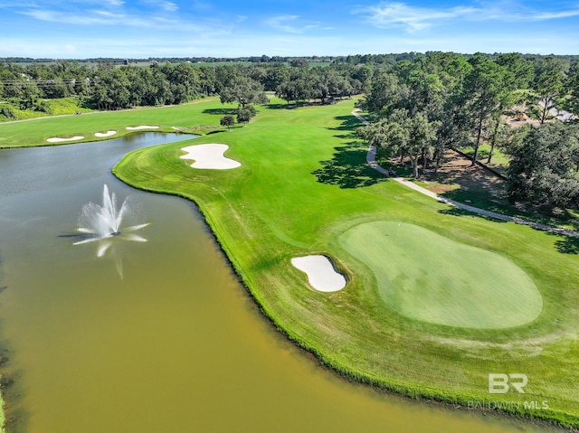 bird's eye view featuring a water view and golf course view