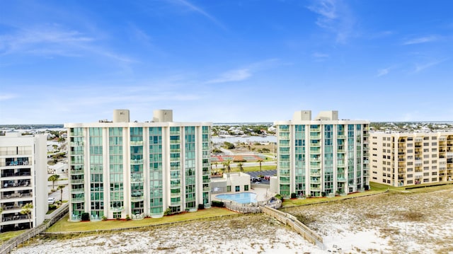 view of building exterior featuring a city view