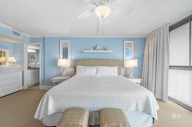 bedroom with visible vents, carpet flooring, and ornamental molding