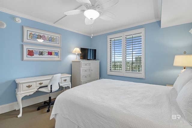 bedroom with ceiling fan, carpet floors, ornamental molding, and baseboards