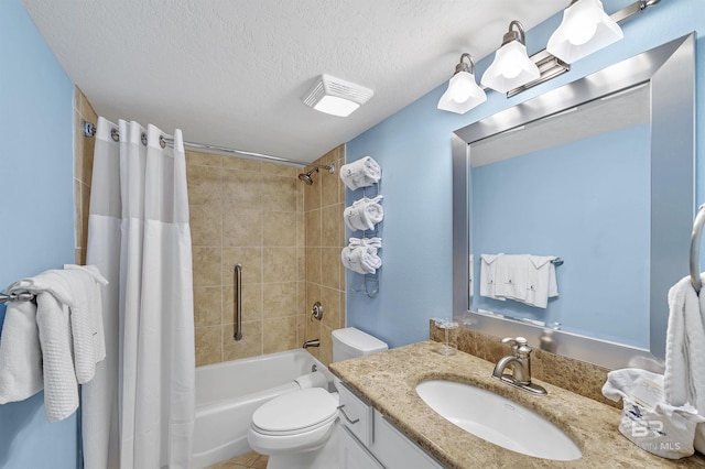 bathroom featuring shower / bath combination with curtain, a textured ceiling, toilet, and vanity