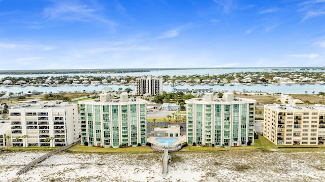 drone / aerial view with a water view and a city view