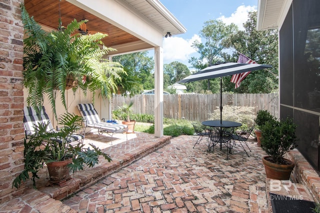 view of patio / terrace featuring ceiling fan