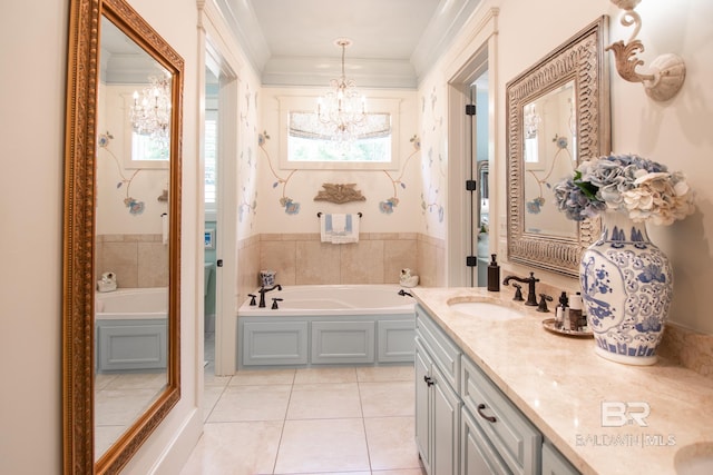 bathroom featuring tile patterned floors, vanity, a bath, ornamental molding, and a chandelier