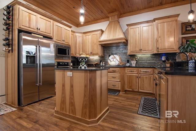 kitchen featuring pendant lighting, appliances with stainless steel finishes, custom exhaust hood, wooden ceiling, and a kitchen island