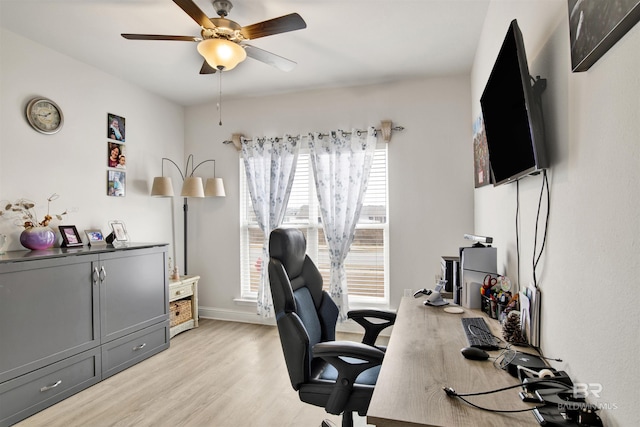 office area with ceiling fan and light hardwood / wood-style flooring