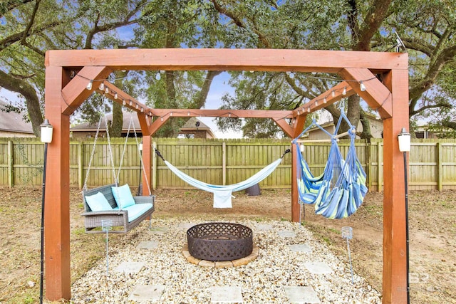 view of jungle gym with a fenced backyard