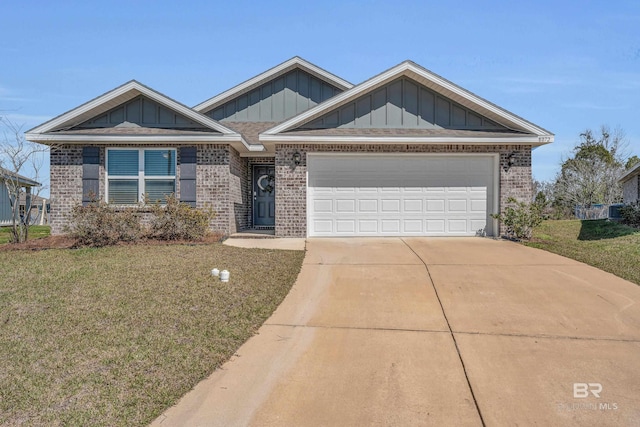 view of front of property featuring brick siding, board and batten siding, a garage, driveway, and a front lawn