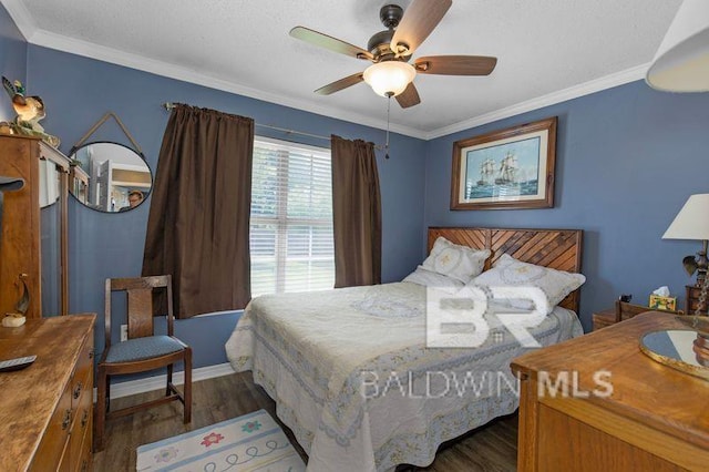23530 Arbor Creek Dr, Robertsdale, AL 36567 - bedroom with wood finished floors, crown molding, baseboards, and ceiling fan