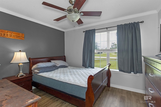 23530 Arbor Creek Dr, Robertsdale, AL 36567 - bedroom with multiple windows, wood finished floors, baseboards, crown molding, and a ceiling fan