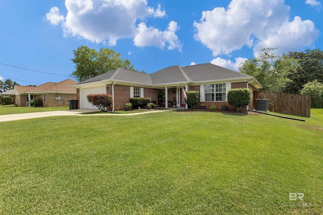 23530 Arbor Creek Dr, Robertsdale, AL 36567 - view of front of property with central AC, driveway, an attached garage, and brick siding