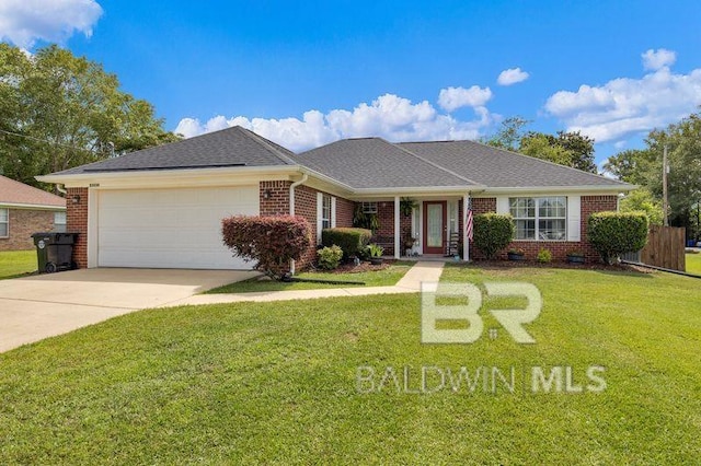 23530 Arbor Creek Dr, Robertsdale, AL 36567 - view of front of property featuring brick siding, a garage, a front lawn, concrete driveway, and roof with shingles