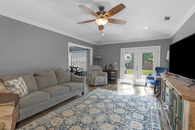 23530 Arbor Creek Dr, Robertsdale, AL 36567 - living area with french doors, wood finished floors, a ceiling fan, recessed lighting, and ornamental molding