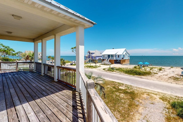 310 Audubon Pl, Dauphin Island, AL 36528 - wooden terrace with a water view