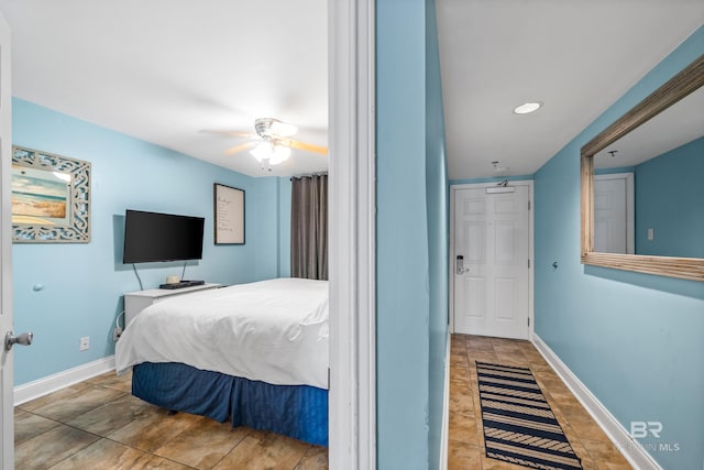24568 Perdido Beach Blvd Unit 502, Orange Beach, AL 36561 - bedroom featuring a ceiling fan, recessed lighting, and stone finish floors
