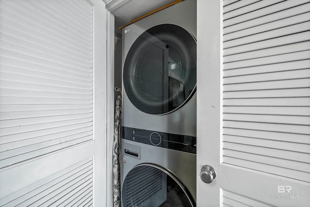 24568 Perdido Beach Blvd Unit 502, Orange Beach, AL 36561 - laundry room featuring stacked washing machine and dryer