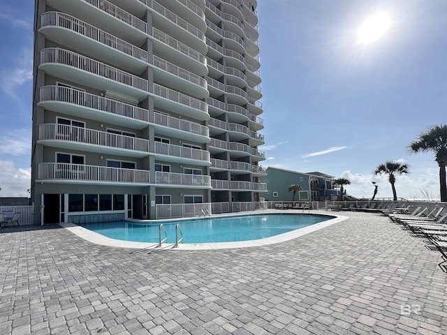 24568 Perdido Beach Blvd Unit 502, Orange Beach, AL 36561 - community pool featuring a patio area