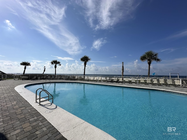 24568 Perdido Beach Blvd Unit 502, Orange Beach, AL 36561 - community pool featuring a patio area