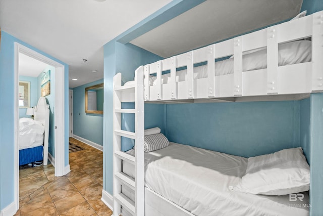 24568 Perdido Beach Blvd Unit 502, Orange Beach, AL 36561 - bedroom with baseboards