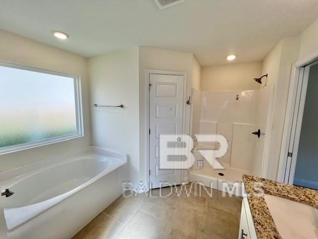 bathroom with separate shower and tub, tile patterned flooring, and vanity