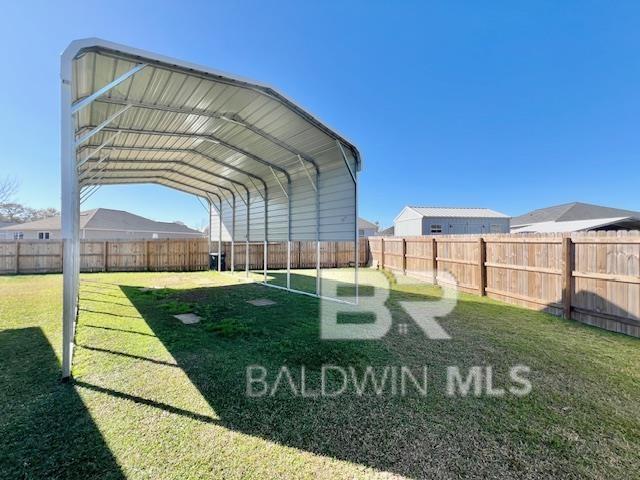 view of yard featuring a carport